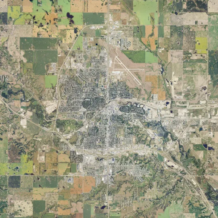 Reference Map, item 9: an aerial view of an area, north at the top.